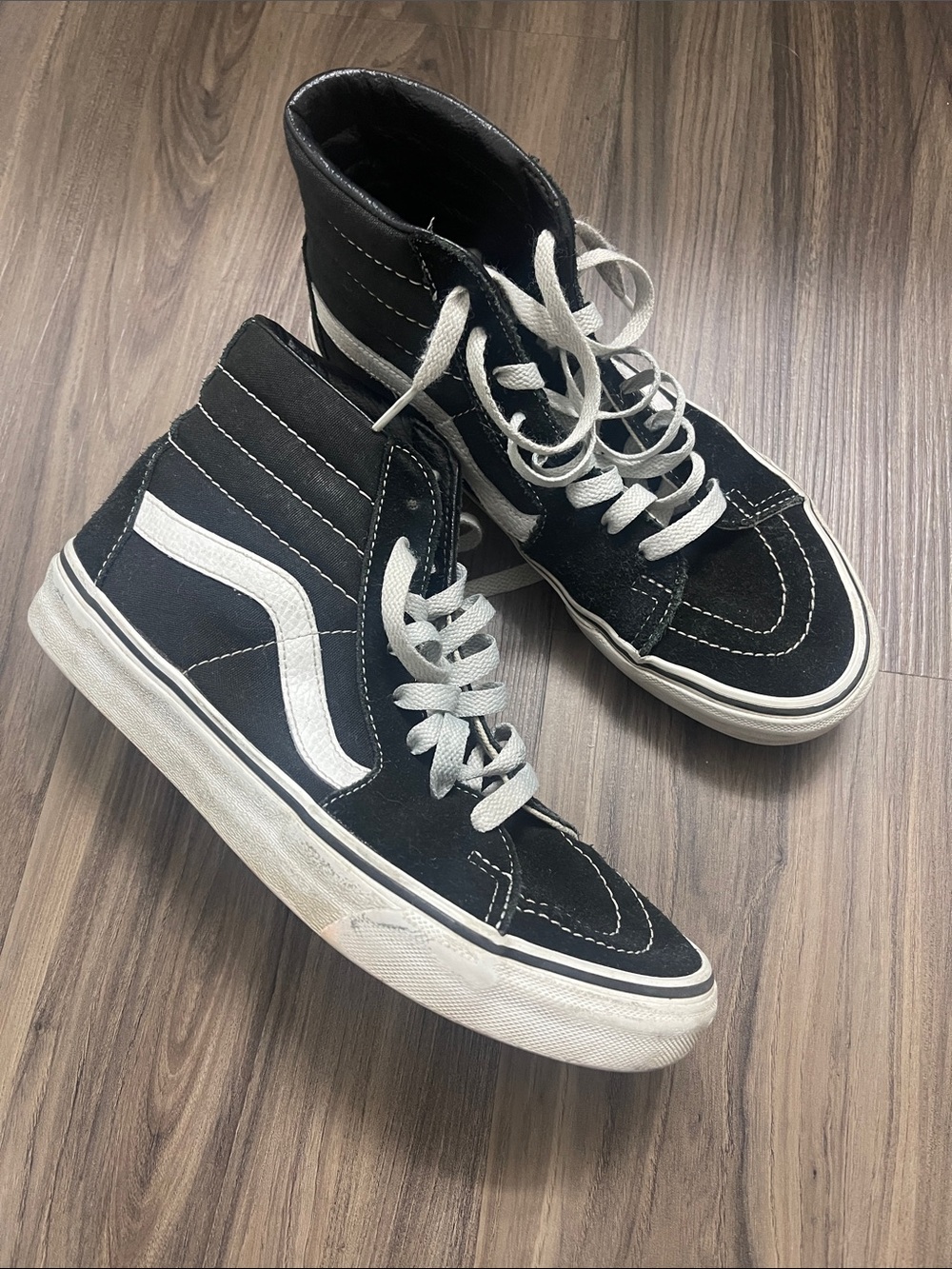 Vans Black and White High-Top Skate Sneakers